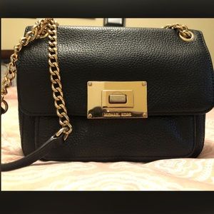 Black and gold Michael Kors purse
